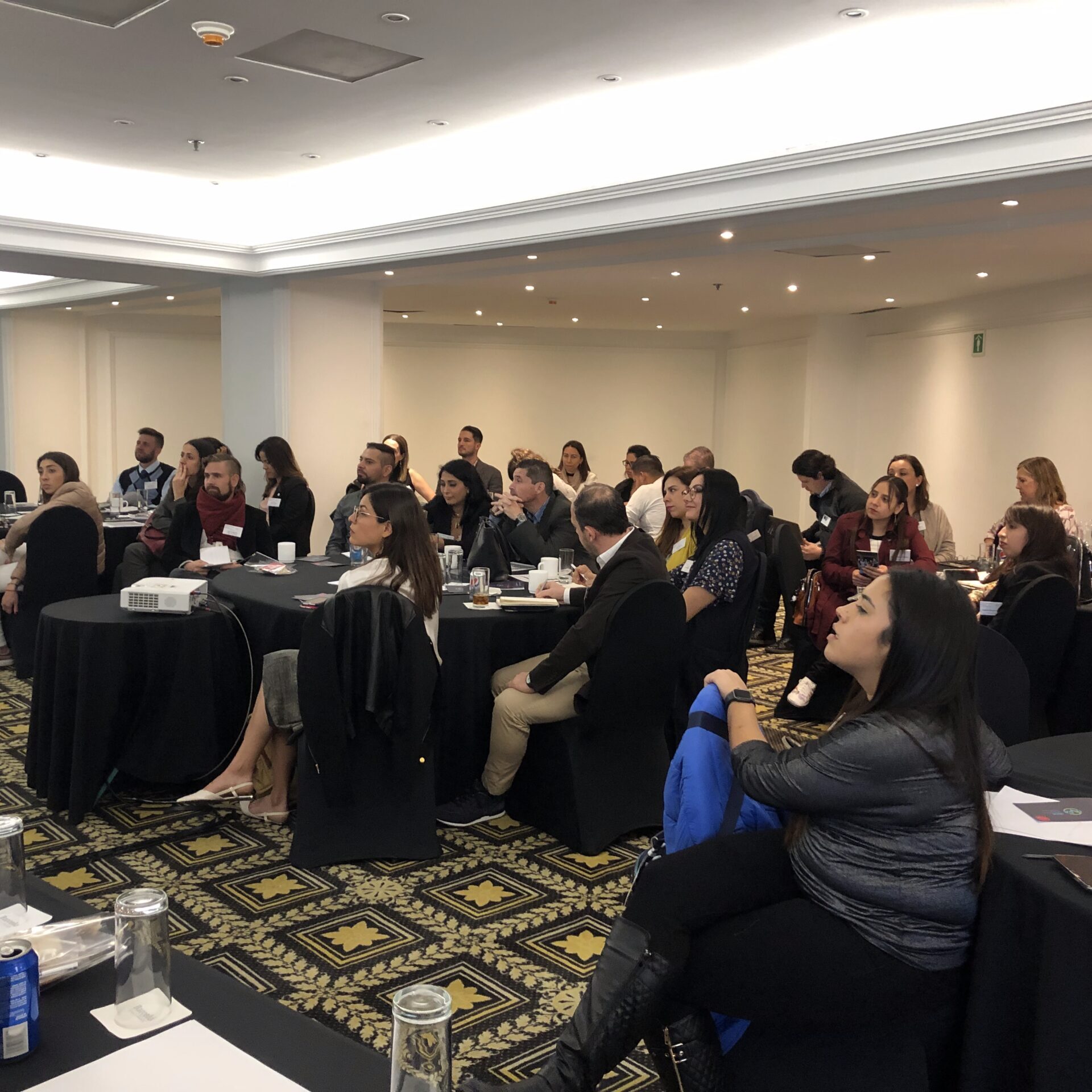 Mexico Workshop 2019 Group sitting at round tables